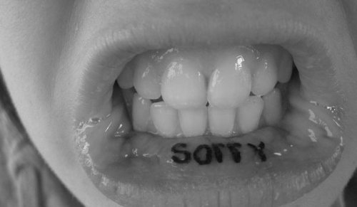 Sorry Inner Lip Tattoo