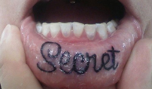 Secret Lip Tattoo