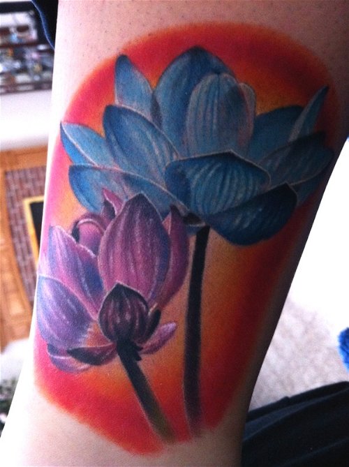 Blue And Purple Lotus Tattoo On Leg