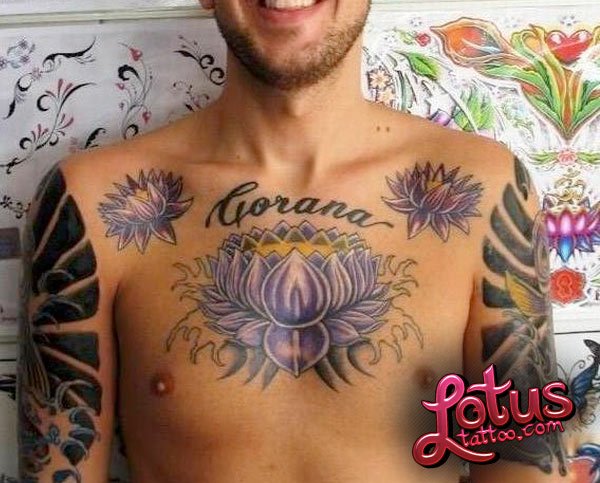 Purple Ink Flower And Lotus Tattoos On Man Chest