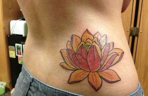Girl Lower Back Lotus Tattoo