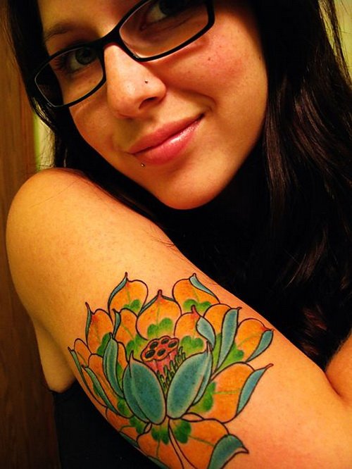 Awesome Colored Lotus Tattoo On Bicep