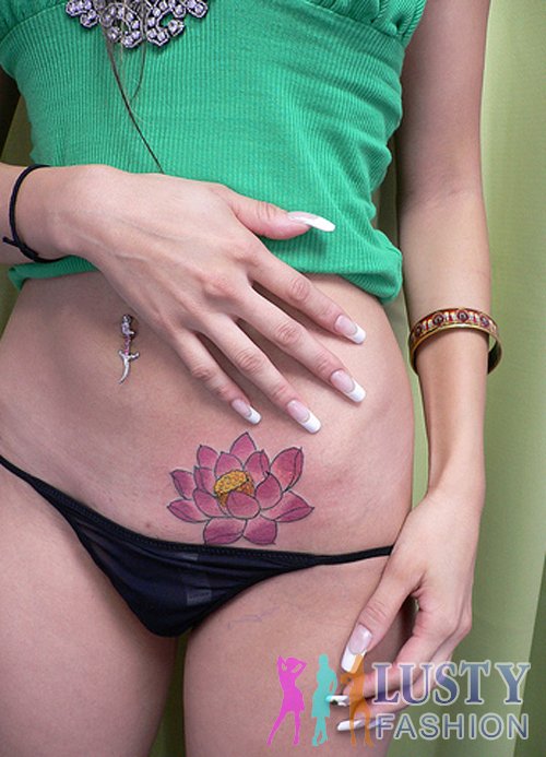 Girl Left Hip Lotus Tattoo