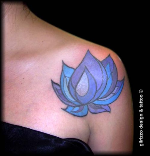 Blue Ink Lotus Flower Tattoo On Left Shoulder