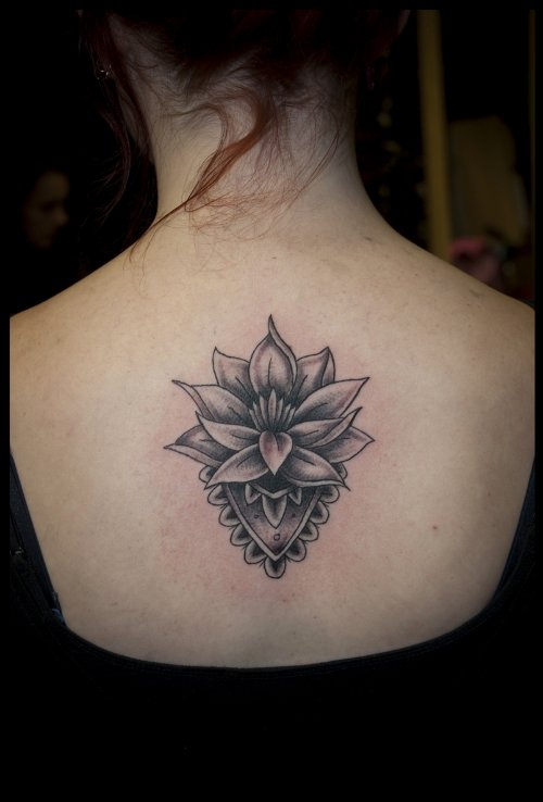 Good Grey Ink Lotus Tattoo On Girl Upperback