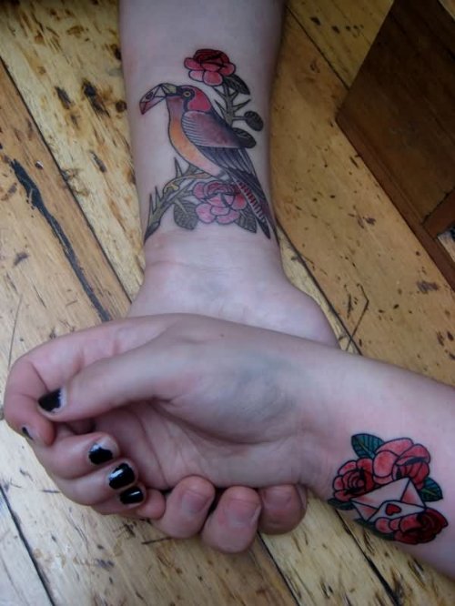 Flowers And Love Tattoos On Wrists
