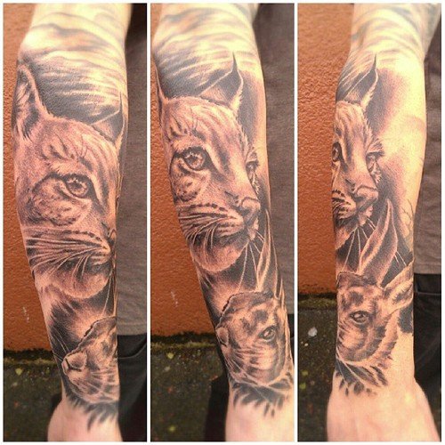 Grey Ink Right Sleeve Lynx Tattoo