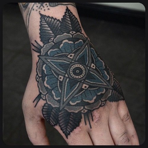 Dark Ink Mandala flower Tattoo On Left Hand