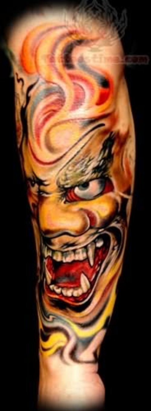 Flaming Mask Tattoo  On Arm