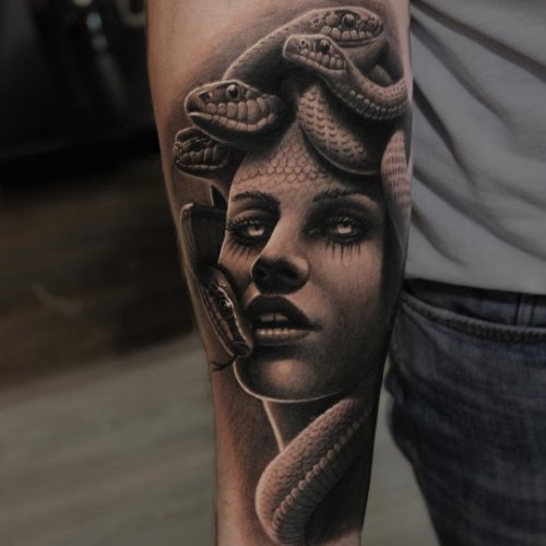 Grey Ink Realistic Medusa Tattoo On Sleeve by Ryan Evans
