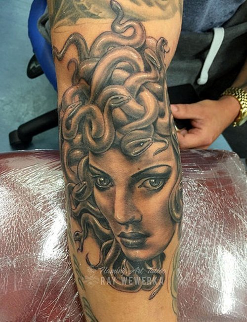 Grey Medusa Tattoo On Man Right Sleeve