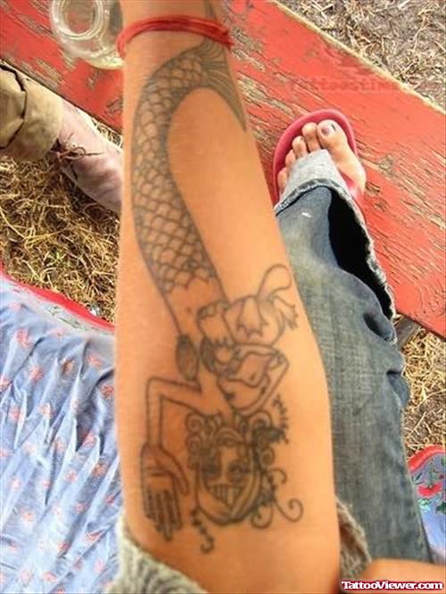 Black ink Mermaid Tattoo On Arm