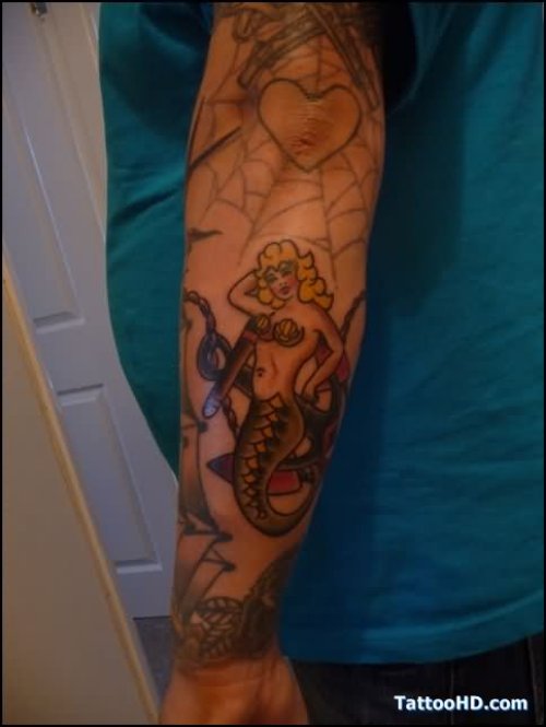 Pinup Mermaid Tattoo On Left Sleeve