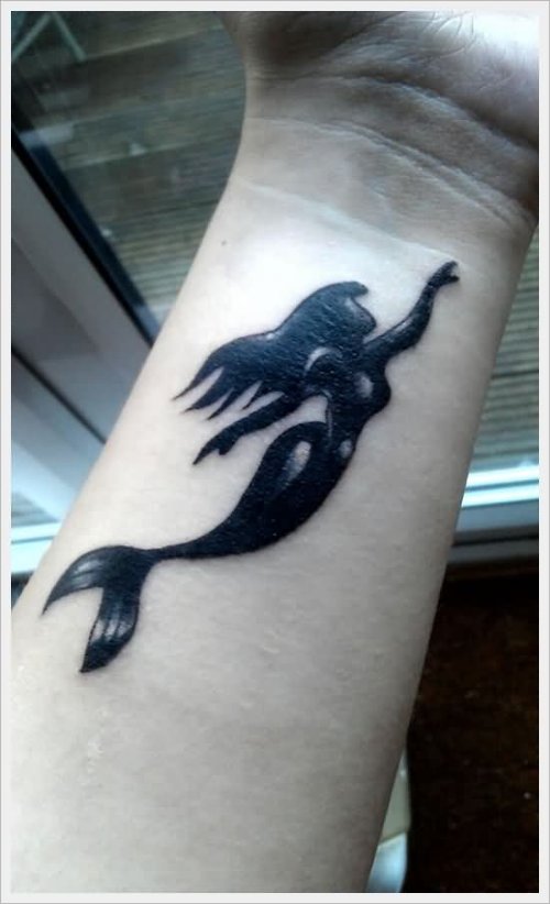Black Ink Mermaid Tattoo On Left Forearm