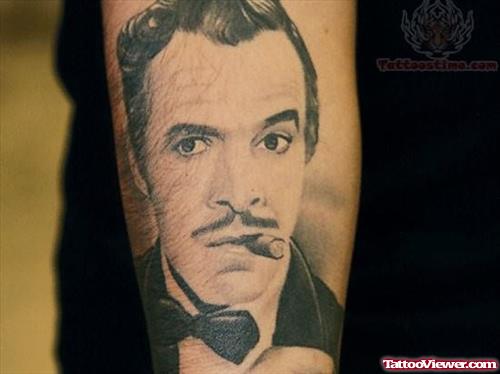 Man With Cigar Tattoo On Arm