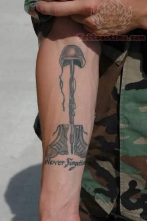 Military Shoes And Helmate Tattoo On Arm