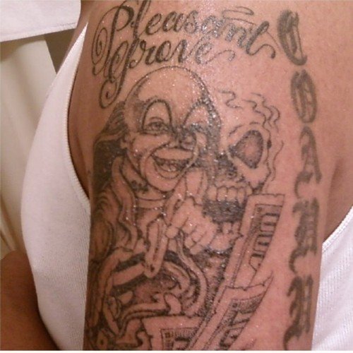 Grey Ink Money Tattoo On Man Left Half Sleeve