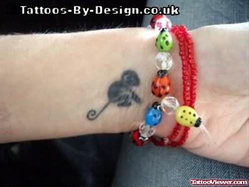 Cheeky Monkey Tattoo On Wrist