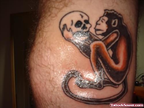 Monkey Holding Skull Tattoo