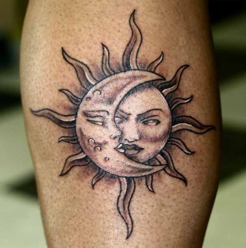Moon And Sun Grey Ink Tattoo On Leg
