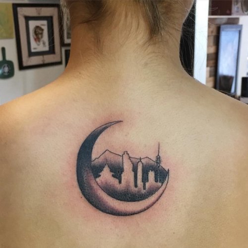 Grey And Black Moon Tattoo On Girl Upper Back
