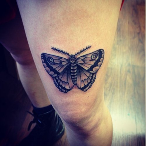 Grey Ink Moth Tattoo On Left Thigh