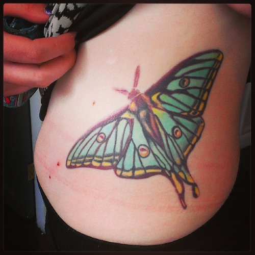 Blue Ink Moth Rib Side Tattoo