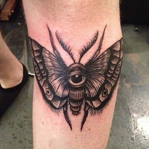 Grey Ink Moth Tattoo On Left Leg