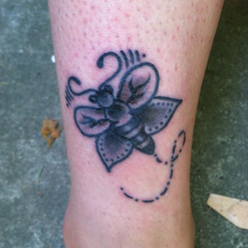 Small Black Ink Moth Tattoo
