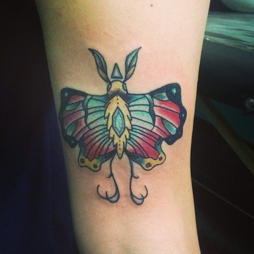 Colorful Moth Tattoo On Right Bicep