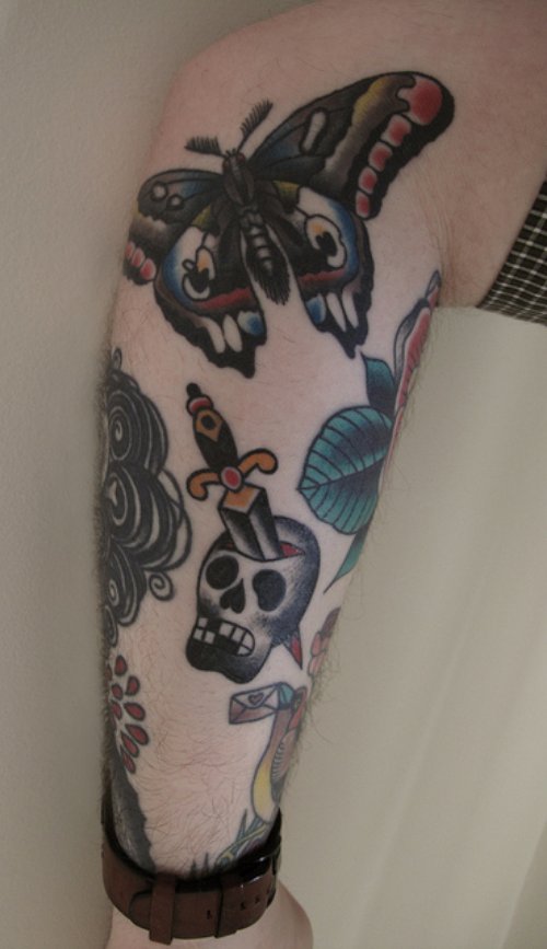 Dagger Skull And Moth Tattoo On Right Sleeve