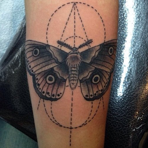 Moth Grey Ink Tattoo On Arm