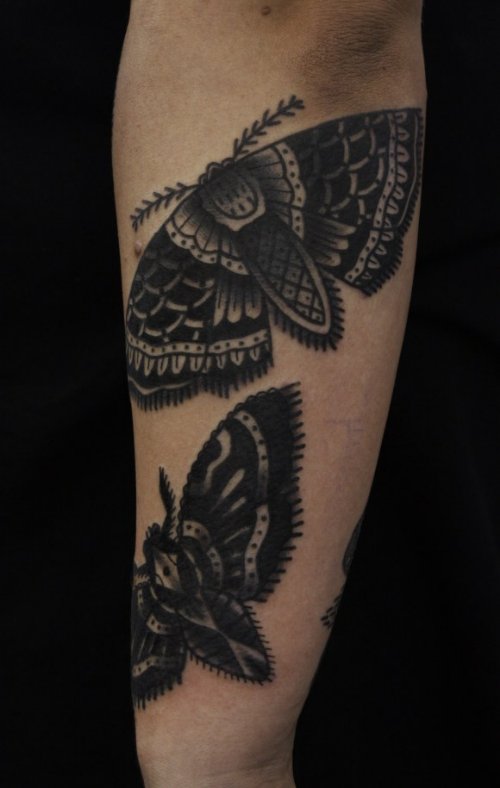 Black Ink Moth Tattoo On Sleeve