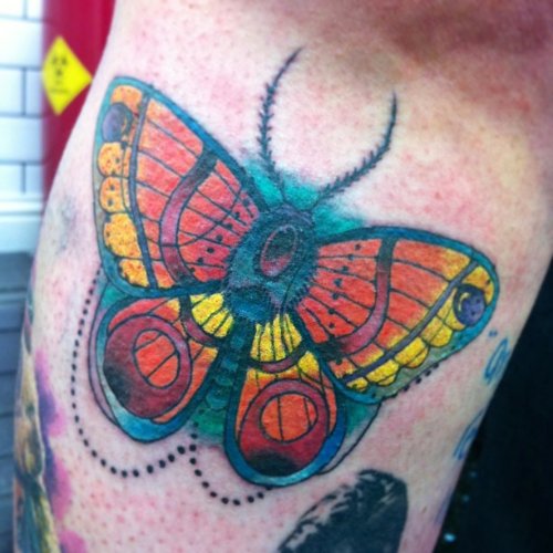 Simple Colored Ink Moth Tattoo