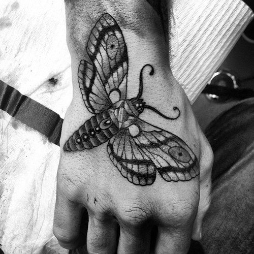 Right Hand Grey Ink Moth Tattoo