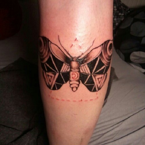 Awesome Grey Ink Moth Arm Tattoo