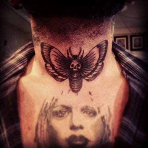 Grey Ink Girl Head And Moth Tattoo On Neck