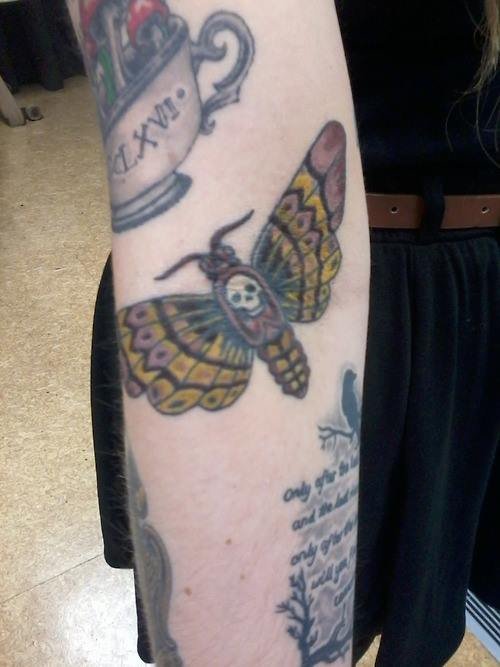 Superb Left Arm Moth Tattoo