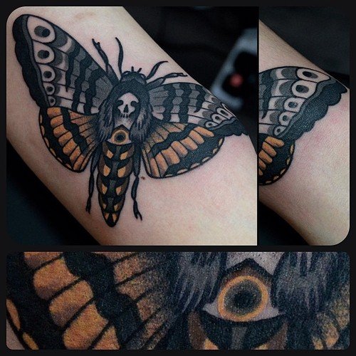 Latest Grey Ink Moth Tattoo On Bicep