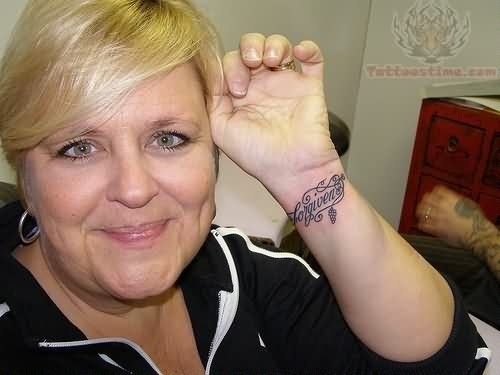 Mother Showing Her Left Wrist Tattoo