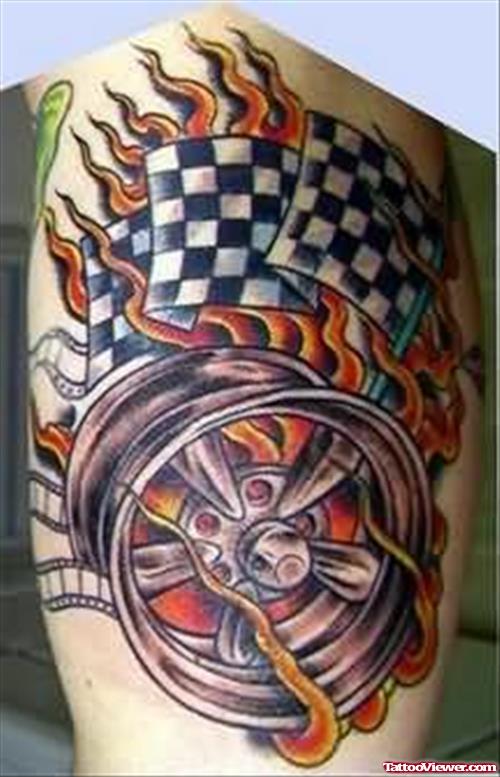 Rally Flames Tattoo On Muscle