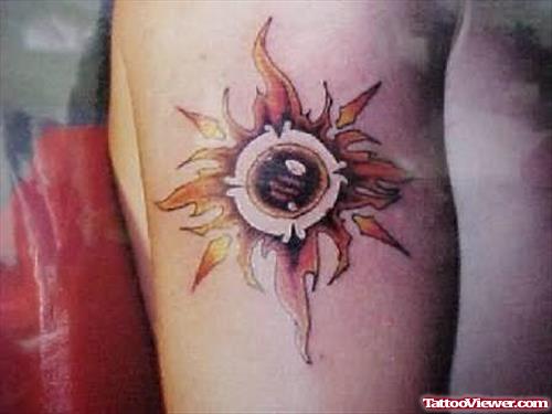 Symbol Sun Tattoo On Muscle