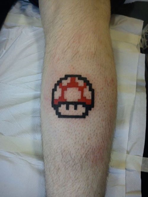 Red Mario Mushroom Tattoo On Arm