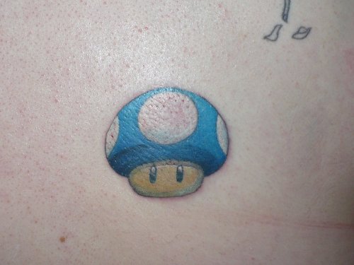 Mario Mushroom Blue Ink Tattoo