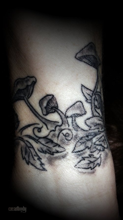 Grey Ink Mushroom and Leafs Tattoo