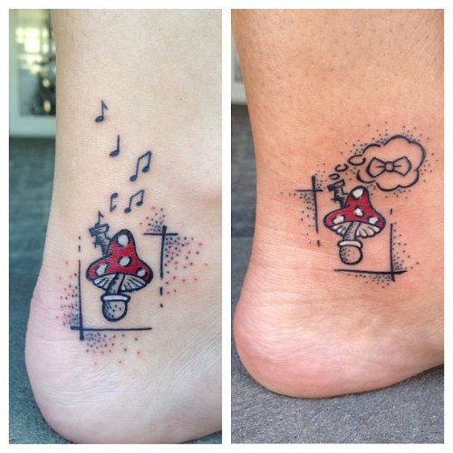 Red Mushroom With Music Tattoo On Heel