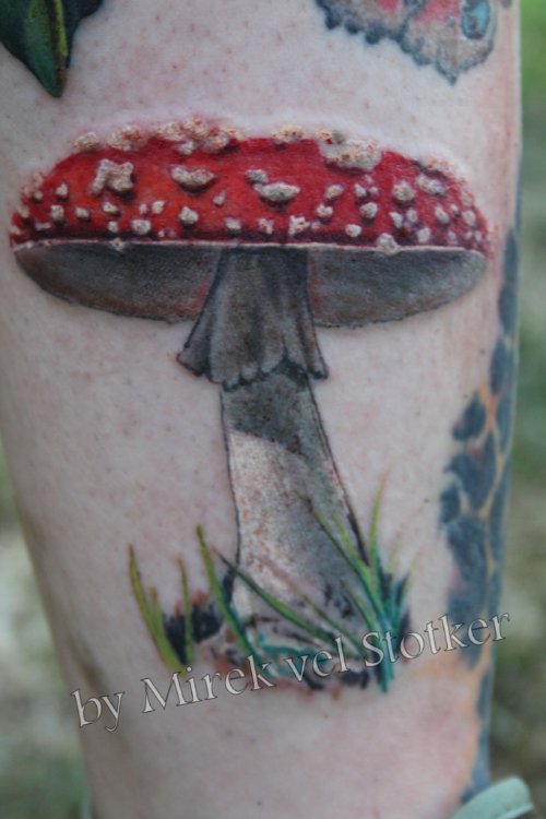 Red Ink Mushroom Tattoo On Leg