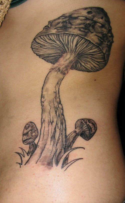 Grey Ink Mushroom Tattoo On Rib Side