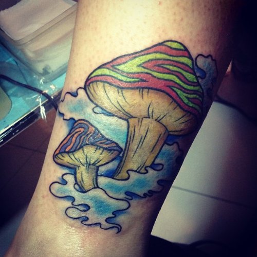 Awesome Colored Mushrooms On Water Tattoo