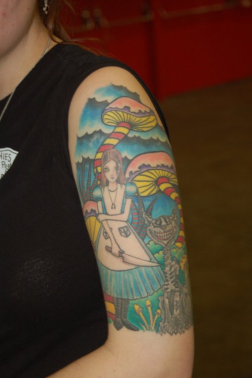 Girl With Knife And Mushroom Tattoos On Left Half Sleeve